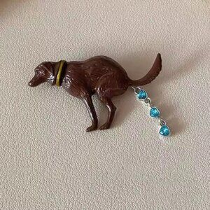 Pooping Dog Brooch with Blue Accents